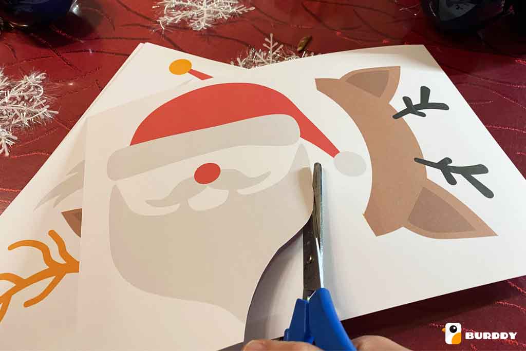 Cut out your Christmas photobooth props using scissors or a cutter